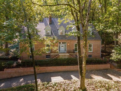 Brick Beauty on over an acre wooded private lot