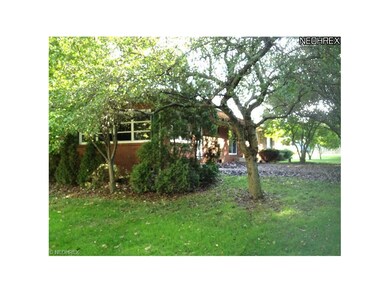 Enclosed rear porch, accessible from back of house