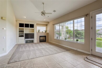 living room overlooking backyard with French door
