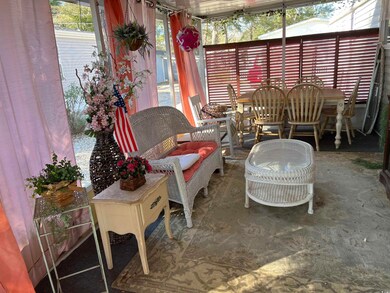 Sunroom featuring a healthy amount of sunlight