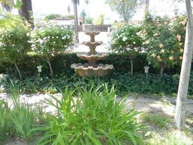 Beautiful fountain and landscape in front of house