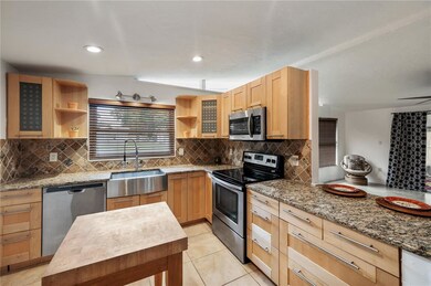 Solid wood cabinets & stainless steel appliances