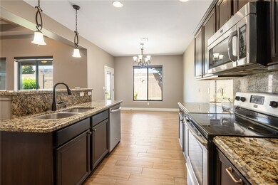 Kitchen with appliances with stainless steel finis