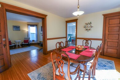 Formal dining area is adjacent to kitchen and main