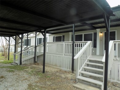 Stairway and ramp to front door