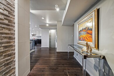 View from entry toward living, dining & kitchen ar