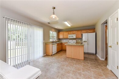Kitchen with large Breakfast area.  Doors open to 