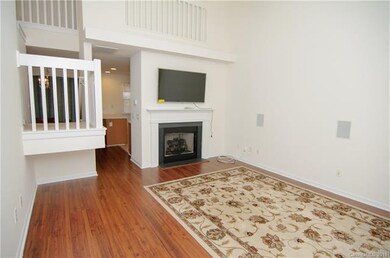 Gas log fireplace in bright great room
