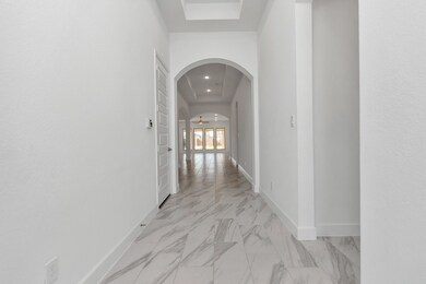 As you walk into the home, notice the high ceiling