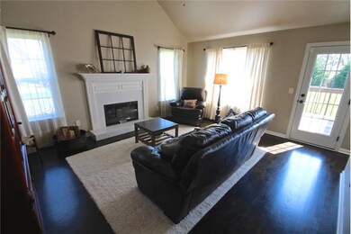 Large Great Room with Vaulted Ceiling and Woodburning Fireplace