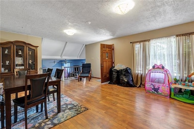 Another view of the space showing the sunken livin