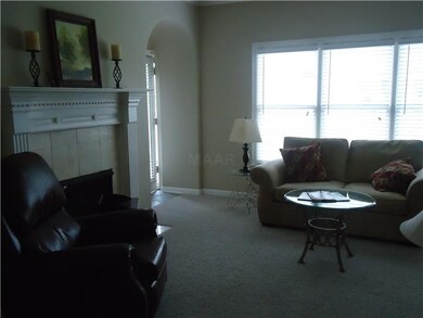 Greatroom has large windows across the back, high 