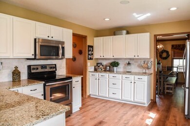 Brand new kitchen with gorgeous white cabinets and