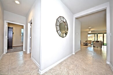 Grand Entry with High Ceilings, beautiful Large Tile Floors laid in an Upgraded brick Pattern and more.