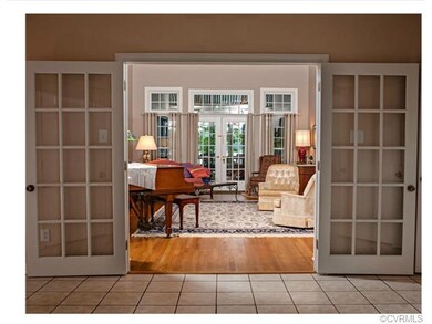 Front center hall enter through french doors to th
