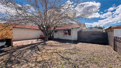 Rear view of property featuring a patio area, fenc