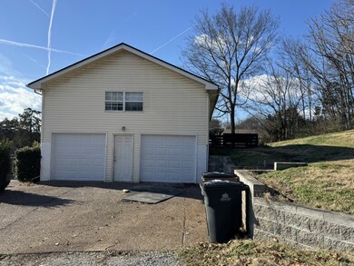 Room for several vehicles in the driveway and a spacious two car garage.