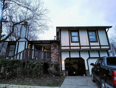 View of front facade featuring a garage