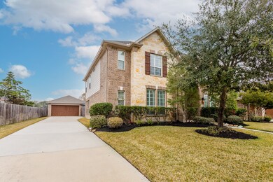 The recessed, detached garage offers the opportunity to add an electric gate for additional secured space outside of the home.