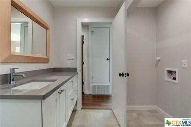 In-bath Laundry area that can accommodate full-siz