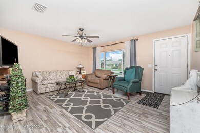Beautiful Living Area With New Wood Floo