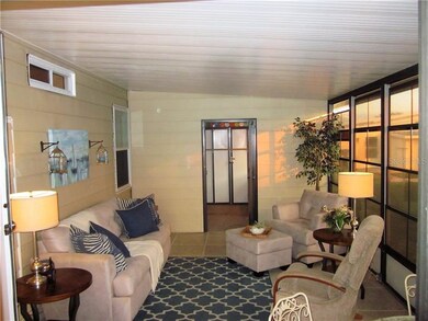Large Florida room with high ceilings.