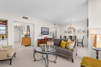 View looking into the entry hall. Partial view of the dry bar.