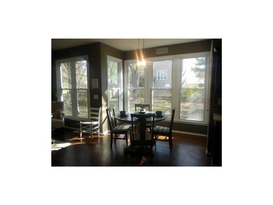 Windowed breakfast area with new lighting overlook