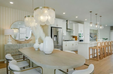 Kitchen featuring decorative backsplash, appliance