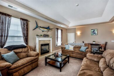 Lots of natural light in Living Room/Dining Room w