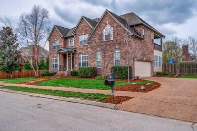 NICELY LANDSCAPED AND 2 CAR SIDE ENTRY GARAGE