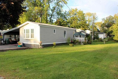 Beautiful Level Lot with carport and covered outdo