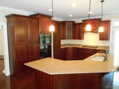 Kitchen with quartz counters, GE Profile appliance