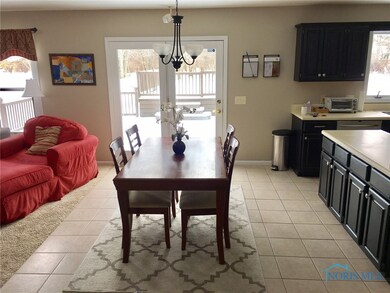 Tile flooring in the dining area and the adjacent