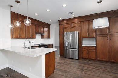 Kitchen featuring appliances with stainless steel