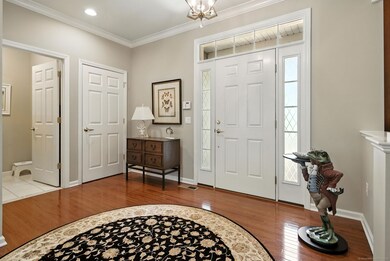 A large foyer greets you when you enter this home