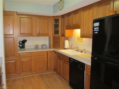 Kitchen with ample cabinets and Pantry to left