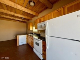 Kitchen featuring white appliances, finished concr