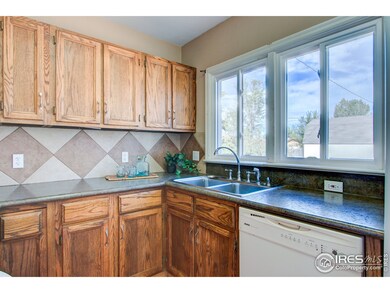 Newer kitchen countertops and full tile splash