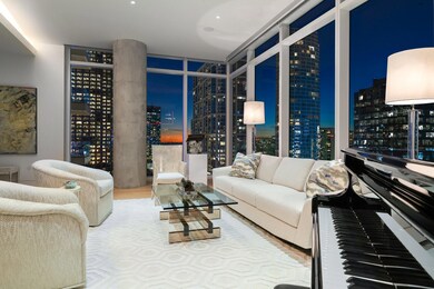 Living room featuring hardwood / wood-style floori