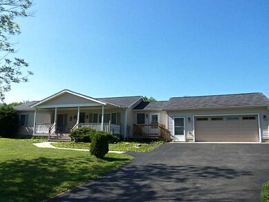 Exterior Front. Paved Drive to 2 Car Garage