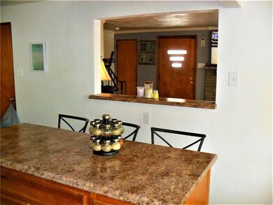 There is a window the connects the kitchen to the 