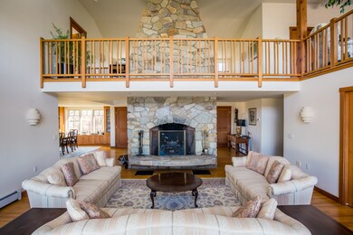 Living room with stone fireplace
