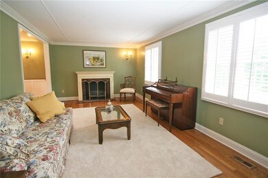 Gather the family!  Hardwood flooring, crown moldi