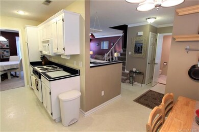 Good view of transition into the kitchen areas from the foyer.