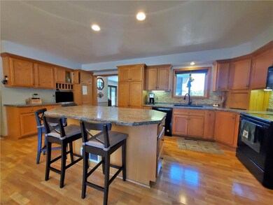 Gorgeous kitchen with storage galore and granite c