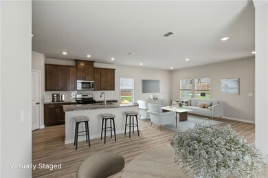 Kitchen with appliances with stainless steel finis