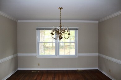 Offers hardwood floor, chair rail and crown moldin