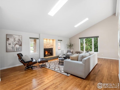 Living Room with Gas Fireplace and Skylights
