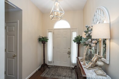 Foyer features a heightened ceiling 